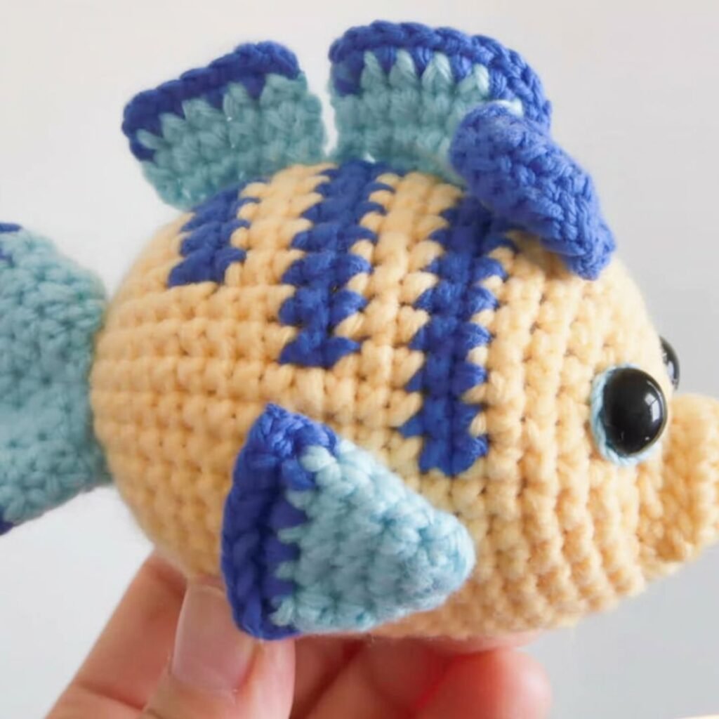 Yellow and blue handmade crochet fish