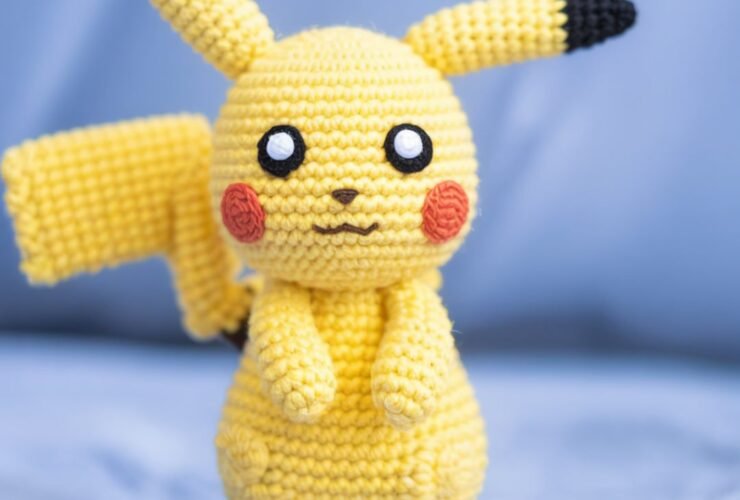Handmade Pikachu Crochet Pattern plush with red cheeks and lightning tail