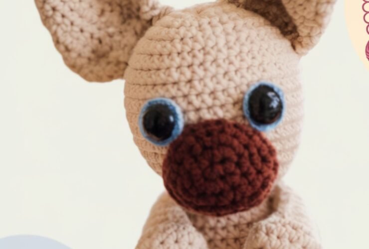 Handmade crochet bulldog pattern plush with large safety eyes, chenille yarn, and oversized ears